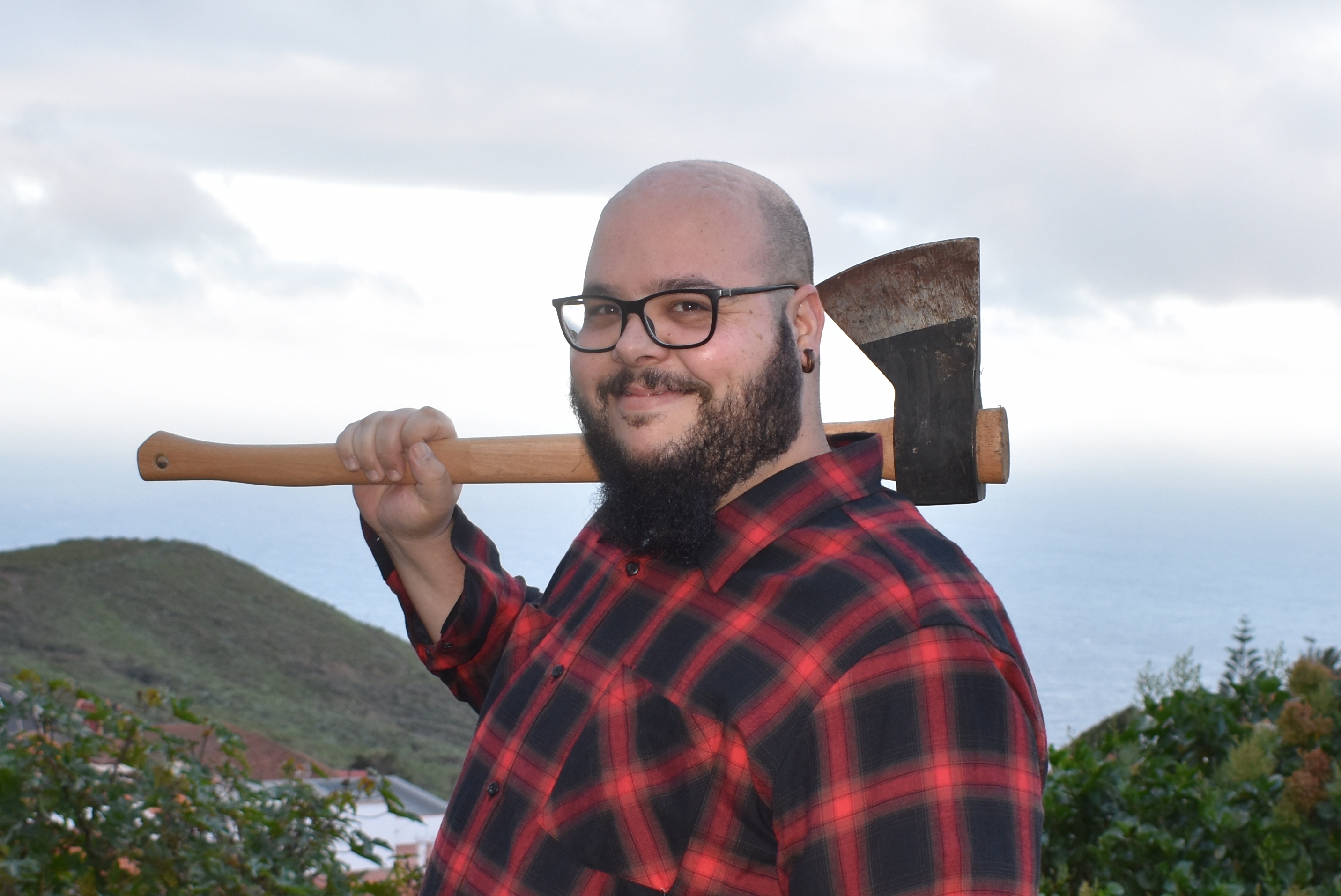 Me dressed as a Lumberjack with an ax on my shoulder